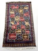 A Balouch rug, Afghanistan, 148 cm x 87 cm.