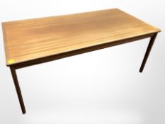 A Danish teak rectangular coffee table designed by Ole Wanscher, 130 cm x 65 cm x 52 cm.