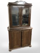 A 19th century continental pine double door cabinet,