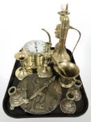 A group of brass ware including Schatz quartz ships circular timepiece, candlesticks, plaque,