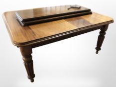 A William IV mahogany extending table and two leaves,