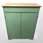 A contemporary painted pine double door cabinet, 109 cm x 50 cm x 137 cm.