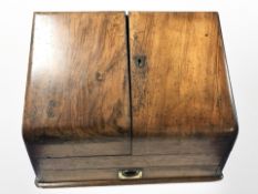 A Victorian walnut sloped correspondence box.
