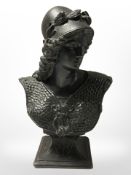 A patinated metal Greek bust, height 18 cm.