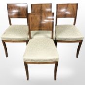 A set of four continental inlaid mahogany dining chairs.