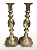 A pair of Victorian brass queen of diamonds candlesticks, height 29 cm.