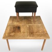 A 20th century teak coffee table,