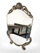 A gilt shield shaped easel mirror, height 41 cm.