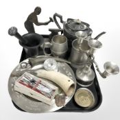 A group of metal wares, pewter candleabrum, charger, tankards, teapot,