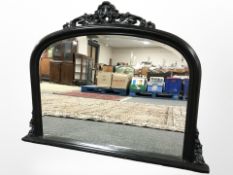 A Victorian style over mantle mirror in black gloss finish,