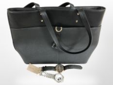 A lady's black leather shoulder bag, width 43 cm,
