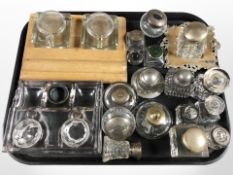 A collection of desk stands and ink wells, some silver mounted.