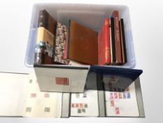 Fourteen albums of miscellaneous stamps.