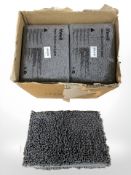 A quantity of new bathroom mats.