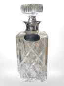 A good quality silver mounted decanter with silver brandy label