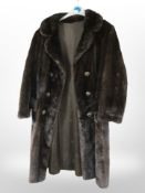 A lady's brown mink fur coat