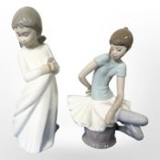 A Lladro seated ballerina and a Nao figure of a girl,
