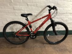 An Apollo Phaze mountain bike.