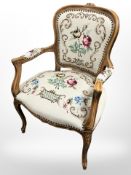 A continental walnut tapestry armchair, width 62 cm.