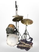 A group of drums, symbols,