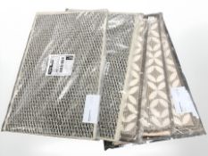 Five packs of three Sainsbury's Home indoor doormats.