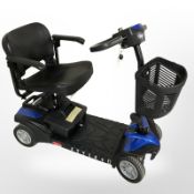 An electric mobility scooter with power charger.