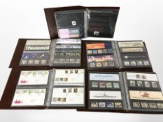 Five albums of Royal Mail mint stamps.