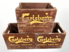 Three vintage painted pine Carlsberg crates,