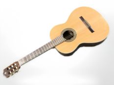 An Alhambra Maestro series acoustic guitar.