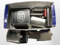 A quantity of hip flasks.