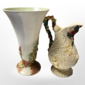 A Clarice Cliff for Newport Pottery jug and further flared vase, height 30 cm.