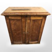 A 19th century pine double door side cabinet, 84 cm x 42 cm x 90 cm.