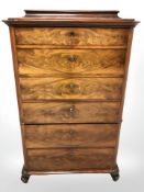 A 19th century six drawer mahogany chest of drawers, on scroll feet,