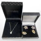 A silver and cubic zirconia heart pendant on rope twist chain and two pairs of costume earrings