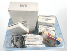 A Nintendo Wii console, various games, controllers, etc.