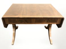 A 19th century inlaid mahogany sofa table, fitted with two drawers, width 100 cm.