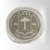 An Equatorial Guinea 1995 CFA 0.999 silver 7000 Francos coin, 20.