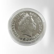 A Queen Elizabeth II 2014 Britannia 2 pound fine silver 0.999 coin, 31.3g.