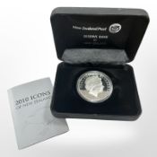 A Queen Elizabeth II 2010 Icons of New Zealand 0.999 silver dollar, 31.3g, cased.