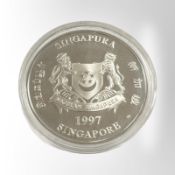A Singapore 1997 Unicef Children 0.925 silver 2 dollar coin, 20g.