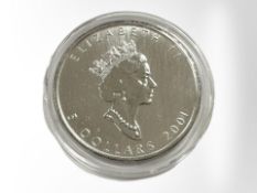 A Queen Elizabeth II 2001 Canadian 5 Dollars 0.999 fine silver coin, 1 oz.