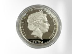 A Queen Elizabeth II Solomon Islands 2000 Olympics cycling 0.925 silver 5 Dollars, 24.9g.