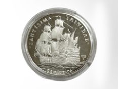 A Santisima Trinidad 2002 10 Pesos 0.925 silver coin, 27.1g.