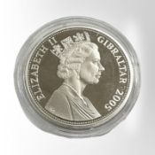 A Queen Elizabeth II Gibraltar 2005 Warship in full sail Trafalgar 0.925 silver five pound coin, 28.