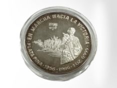 A Republica De Cuba 10 Pesos 0.999 fine silver coin, 1 oz.