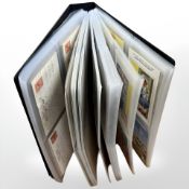 A large album containing a large quantity of humours postcards