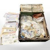 A box of large quantity of loose stamps, folder of vintage news papers,