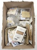 A box of loose franked stamps, vintage and later stamps, booklets,