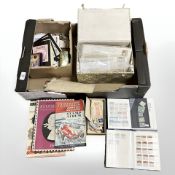 A box of quantity of loose stamps, vintage stamp album, stamp catalogue books,