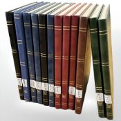 Twelve stock albums of world stamps; including football, railways, junior stamps, butterflies,